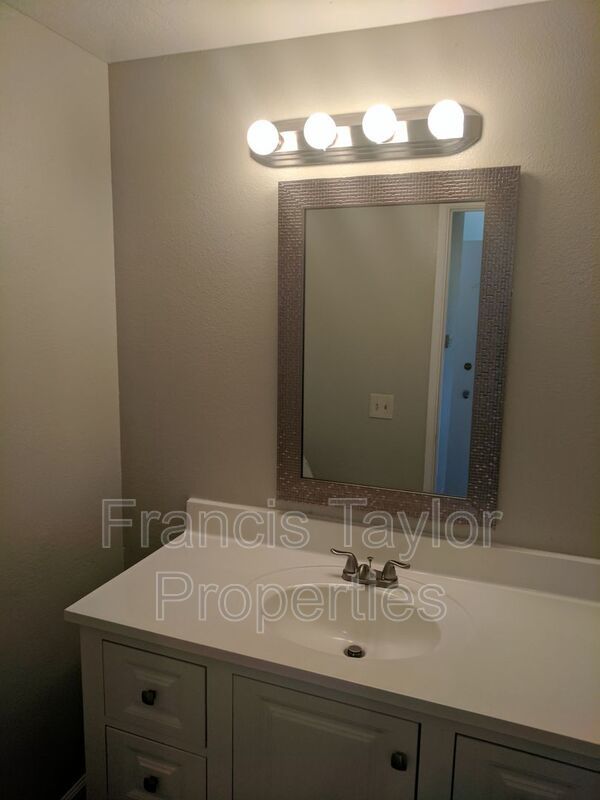 Remodeled Two Bedroom Townhouse with Fenced Backyard property image