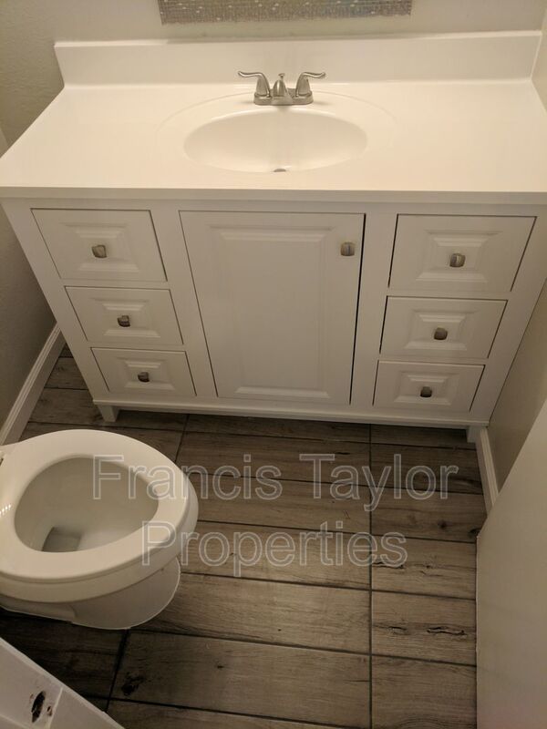 Remodeled Two Bedroom Townhouse with Fenced Backyard property image